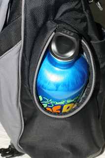Go GaGa Messenger bag fits a one-liter Sigg or other style water bottles in its insulated side pocket